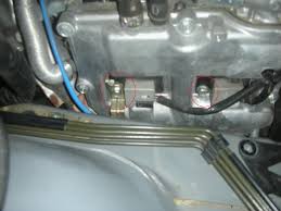 Sti spark plug location