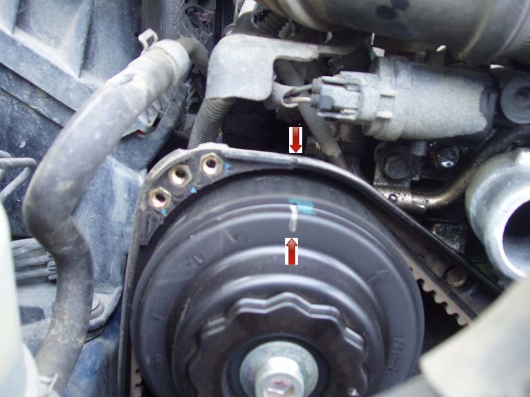 Timing Belt: Upper Left: Notice that the lines on the old belt are all rubbed off.