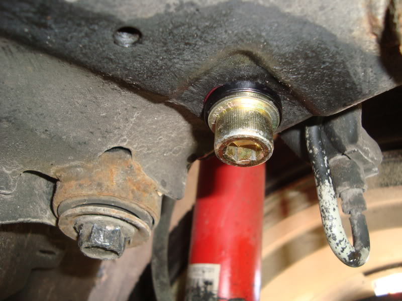 Subframe Lockbolt install for Subaru WRX/STi: Put anti seize like this on the lockoutbolts. This is what it should look like when using KartBoy bolts.