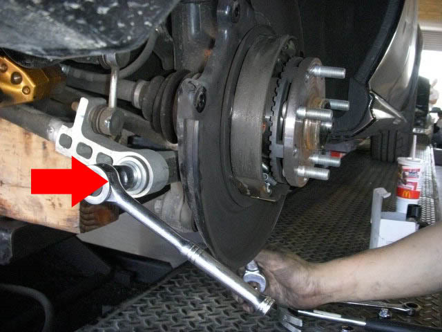 Lateral Links: Remove nut and long bolt.