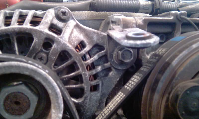 Alternator Replacement Subaru WRX/STi: Loosen this bolt.