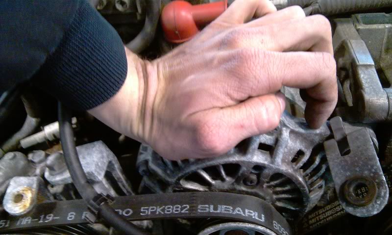 Alternator Replacement Subaru WRX/STi: You might have to push down the alternator by hand.