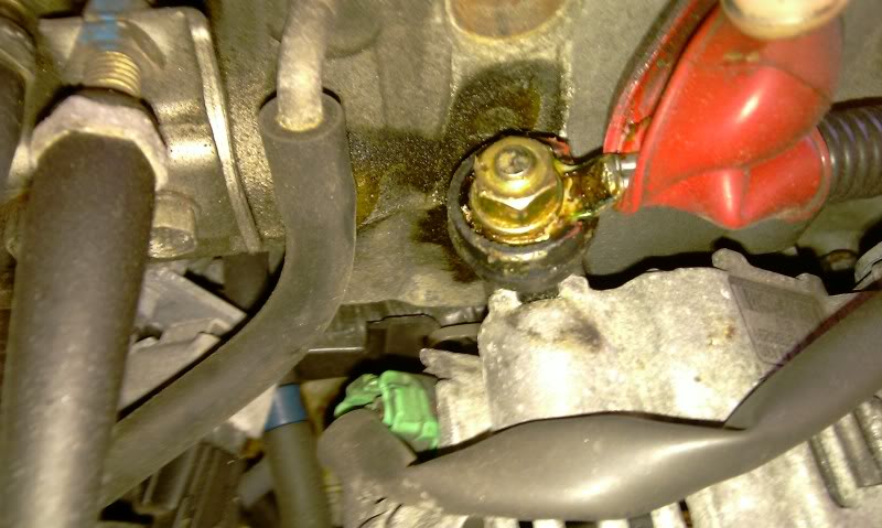 Alternator Replacement Subaru WRX/STi: Remove the nut and green clip.