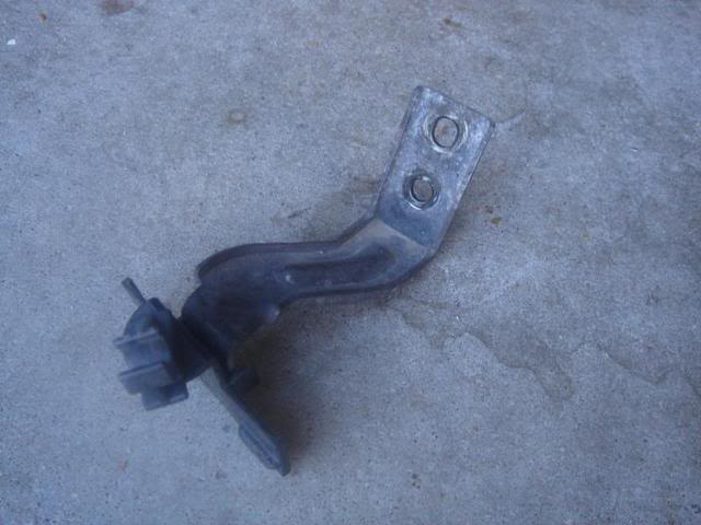 Master Cylinder Brace: Remove this bracket.