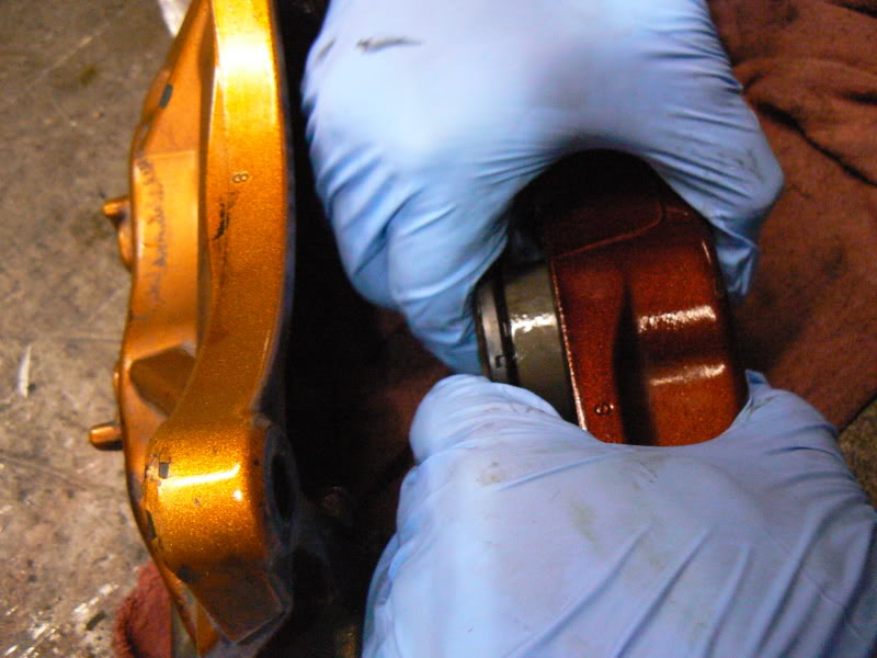 Brembo Caliper: Pushing the pistons back in.