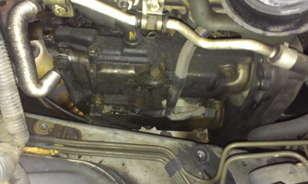 Valve cover gasket: In the center are the two coil packs that need to be removed.