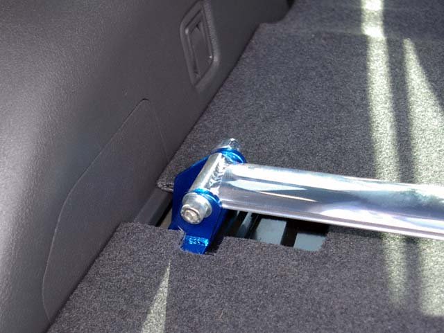 Rear strut brace install on Subaru WRX/STi 08+: What the hatch floor looks when it's cut.