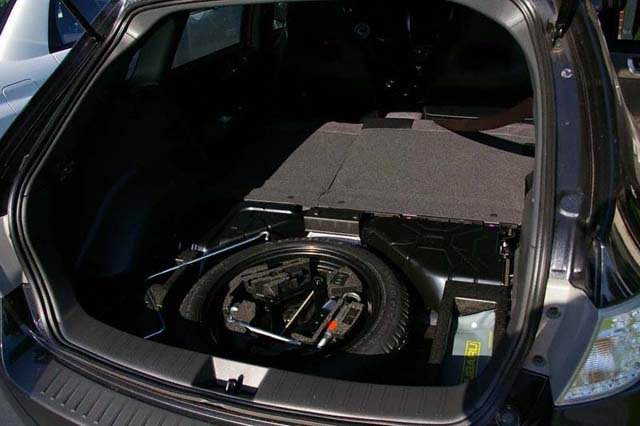 Rear strut brace install on Subaru WRX/STi 08+: Remove the rear floor.