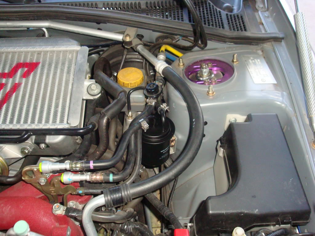 Maintenance: Subaru Periodic Vehicle Maintenance Services: Pictured is a Subaru STi fuel system. Making sure your filter is in good condition and is replaced regularly will prevent problems from occurring.