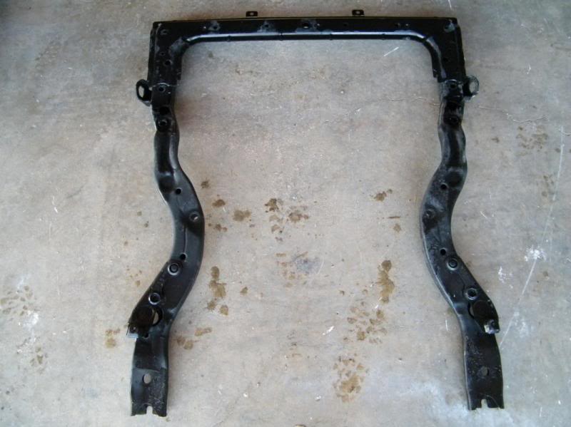 Front sway bar and endlinks install on 02-07 STi: The sub-frame is an odd looking, approximately C shaped, bracket under the front part of the car. The opening of the C is toward the rear of the car. It helps to remove this to make it easier to get to the bolts that hold the sway bar onto the frame.