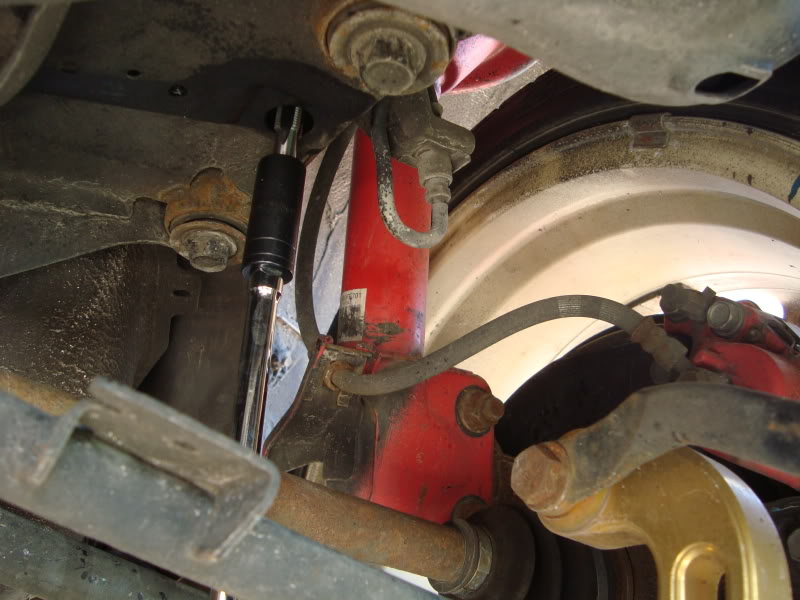 Subframe Lockbolt install for Subaru WRX/STi: Chase the threads with a thread chaser and don't forget to lubricate while doing so.