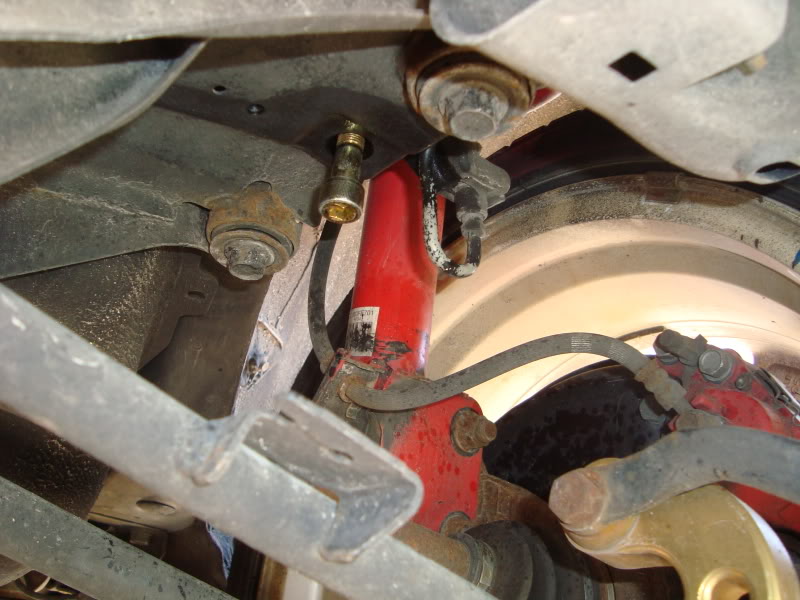 Subframe Lockbolt install for Subaru WRX/STi: Test fit the subframe lockbolts.