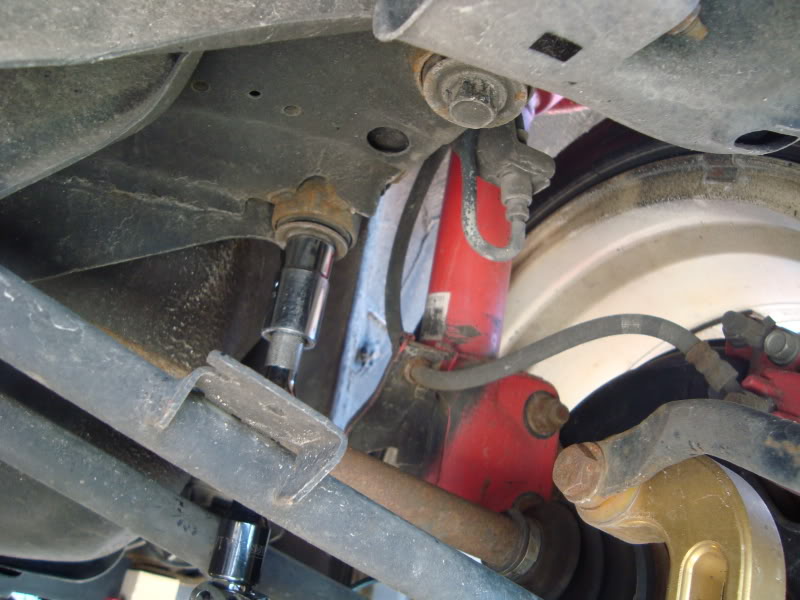 Subframe Lockbolt install for Subaru WRX/STi: You'll have to use an extension with your 6 pointed socket to get at the subframe bolts.
