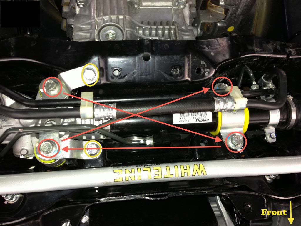 Steering Rack Bushings Install on a 08+ STi: Torque down the FOUR 14mm bolts circled in red in a crisscross pattern first. After those are done torque down the remaining 2 14mm bolts circled in yellow.