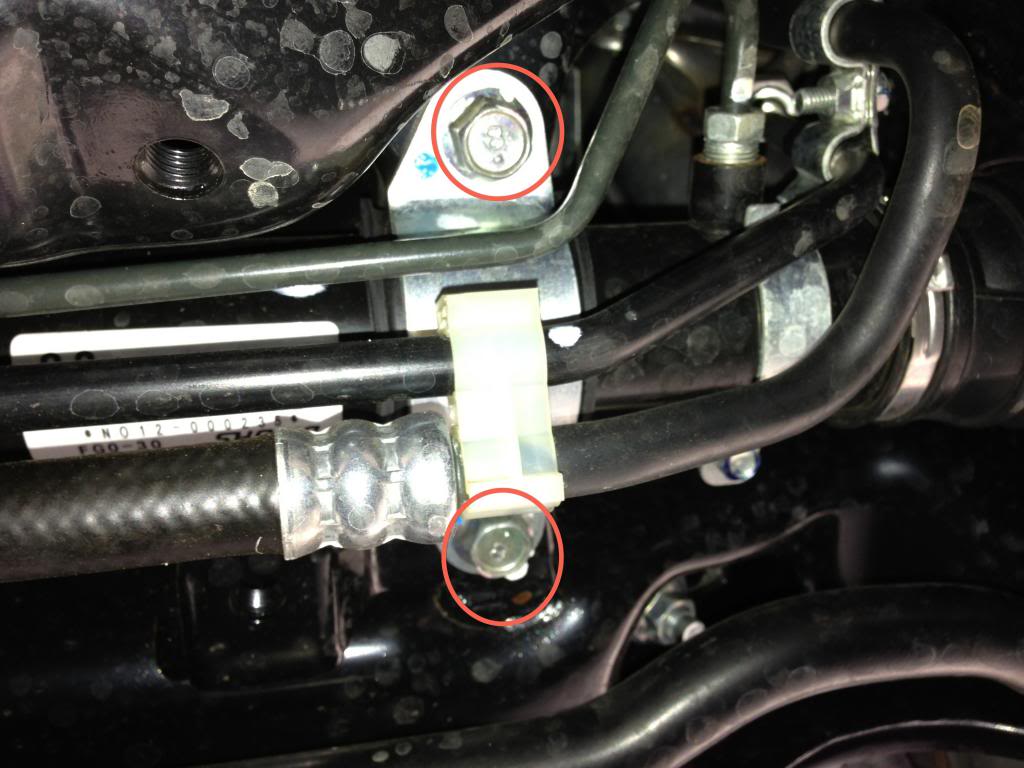 Steering Rack Bushings Install on a 08+ STi: You might have to use the flathead screwdriver to pry the metal bracket away from the bushing initially.