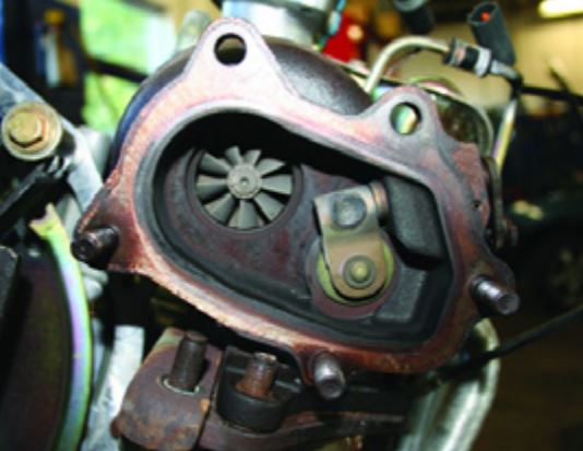 Subaru Turbocharger: The wastegate valve is located in the turbo exhaust side housing.